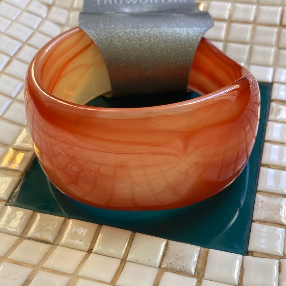 Elegant Orange Swirl Bracelet